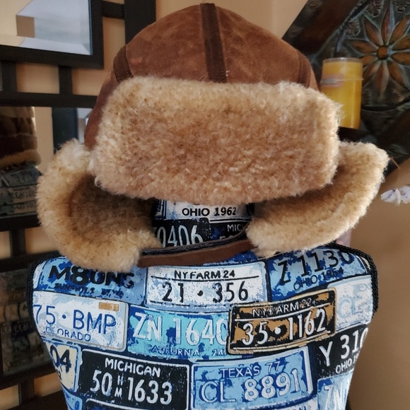 Other - WARM BROWN LEATHER HAT WITH FAUX FUR